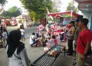 Sinergi TNI-Polri Amankan Jalan Santai Semarak HUT RI di Kelurahan Jogoyudan