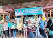 Babinsa Koramil 1015-07/Parenggean Dampingi Kegiatan Pasar Murah