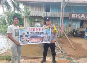 Bhabinkamtibmas Polsek sanaman mantikei mensosialisasikan tentang karhutla,saberpungli,ilegal loging dan ilegal mining