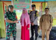 Babinsa Pastikan Penyaluran BLT DD di Desa Bakungin Berjalan Lancar dan Aman.