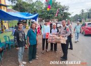 Satlantas Polres Pulang Pisau Bagikan Makanan Ringan Gratis Bagi Jamaah Haul Ke-20 Abah Guru Sekumpul