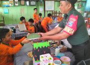 Peduli Anak Sekolah,Babinsa Dampingi Pelayanan Makan Bergizi Gratis