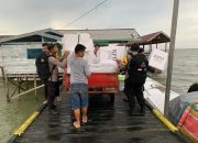 Polres Paser Pastikan Distribusi Logistik Pilkada Serentak 2024 di Kec.Tanjung Harapan Berjalan Aman dan Lancar