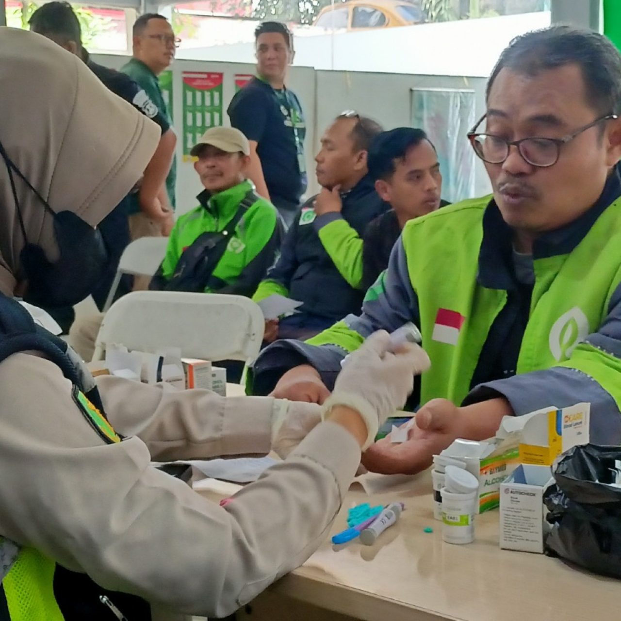 Senyum Ceria Driver Ojol Dapat Layanan Kesehatan Gratis dari Polresta Malang Kota Jelang Hari Bhayangkara ke -79